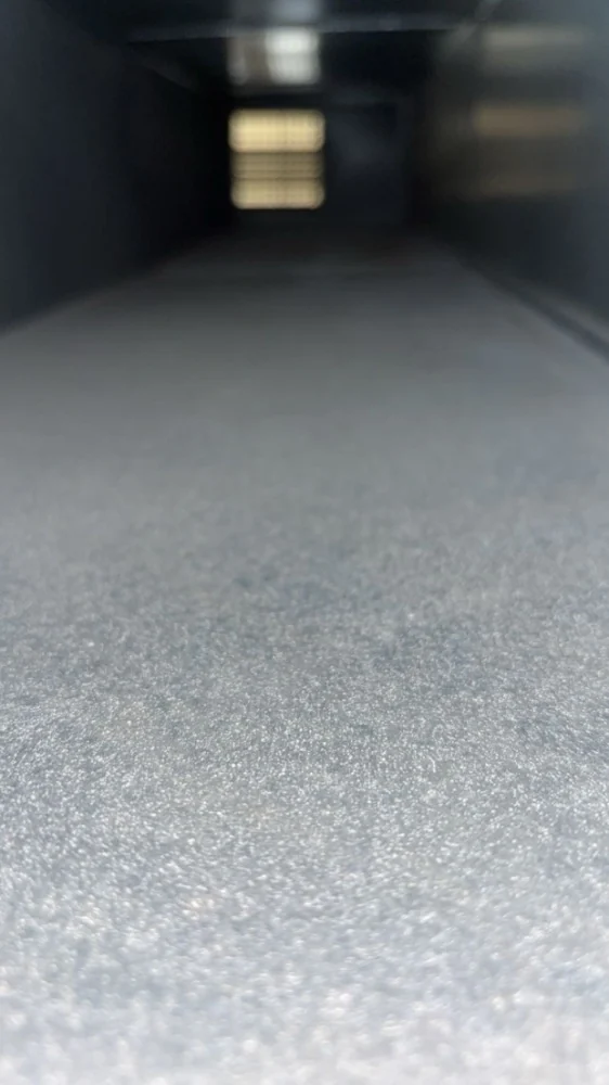 The same duct run after cleaning